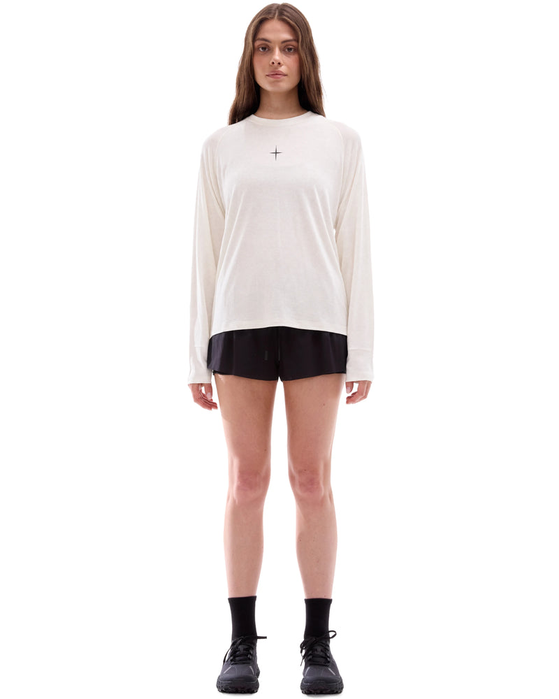 INNER SELF Lightweight Merino Running LS in off-white — full-length view on female model