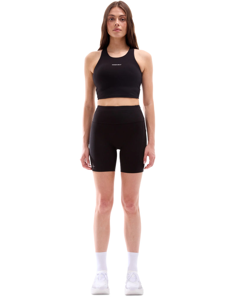 INNER SELF Women's High-Neck Running Crop in black — full-length view on female model