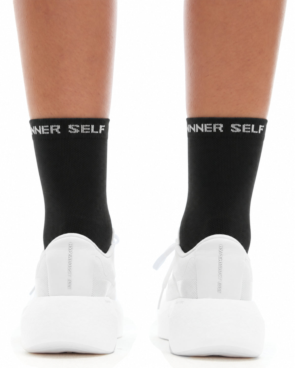 INNER SELF Performance Running Socks in black — back view