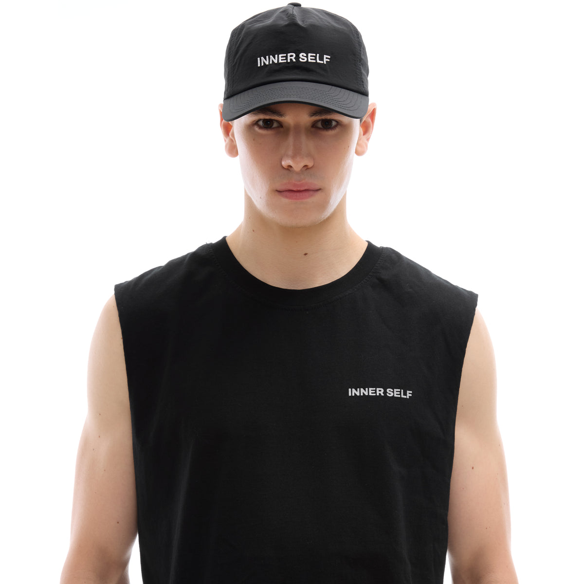 INNER SELF Daily Cap in black — front view on male model