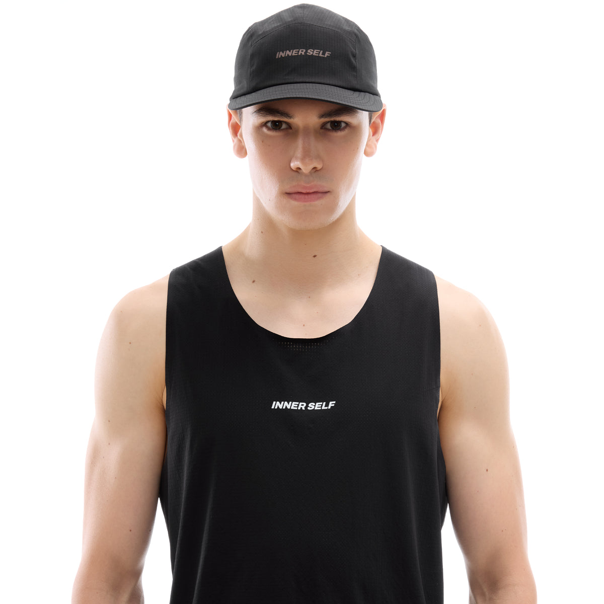 INNER SELF Performance Cap in black — front view on male model