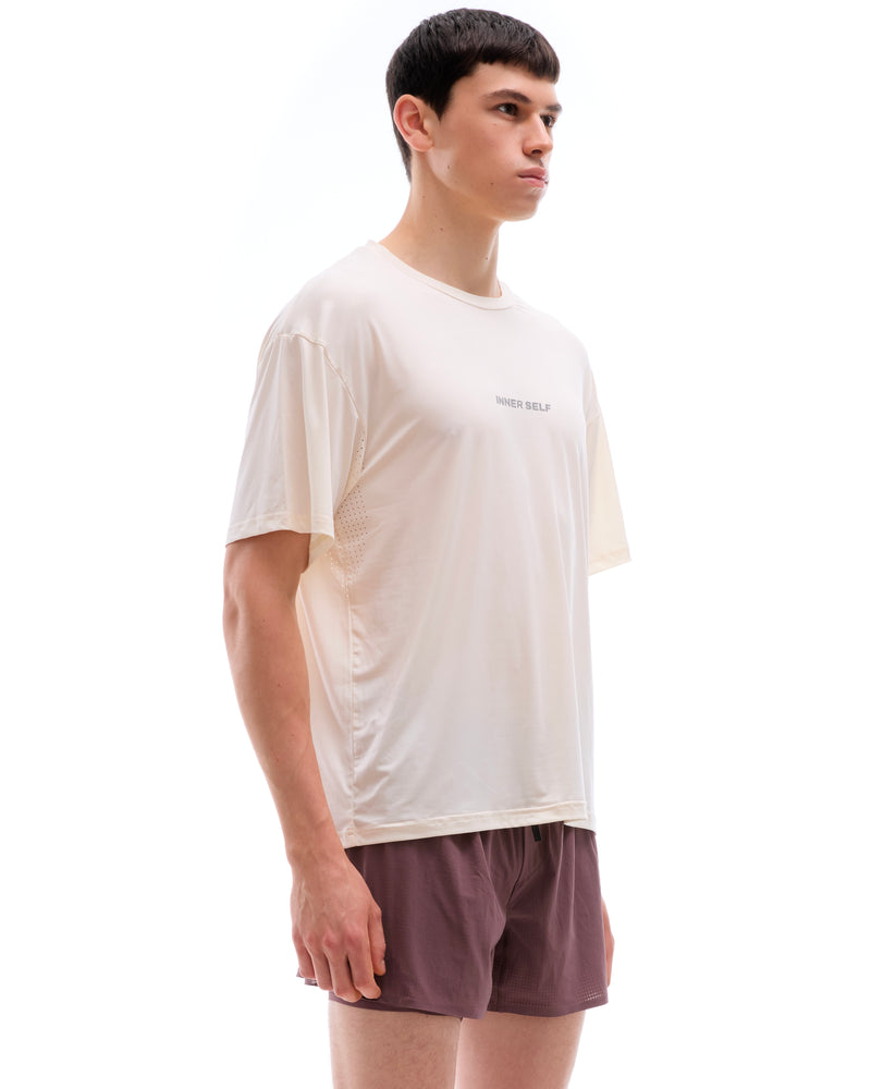INNER SELF Performance T-shirt in white — three-quarter view on male model