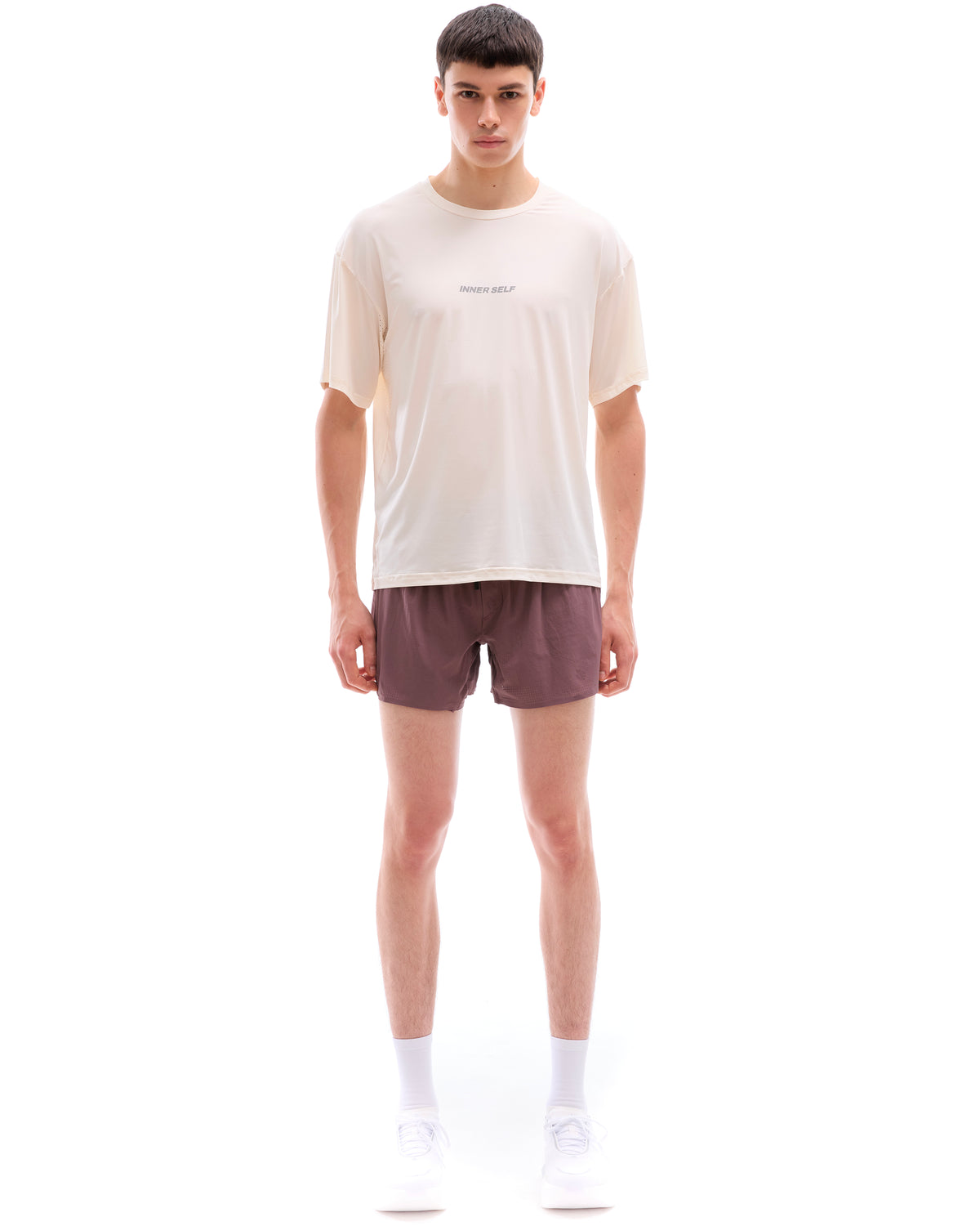 INNER SELF Performance T-shirt in white — full-length view on male model