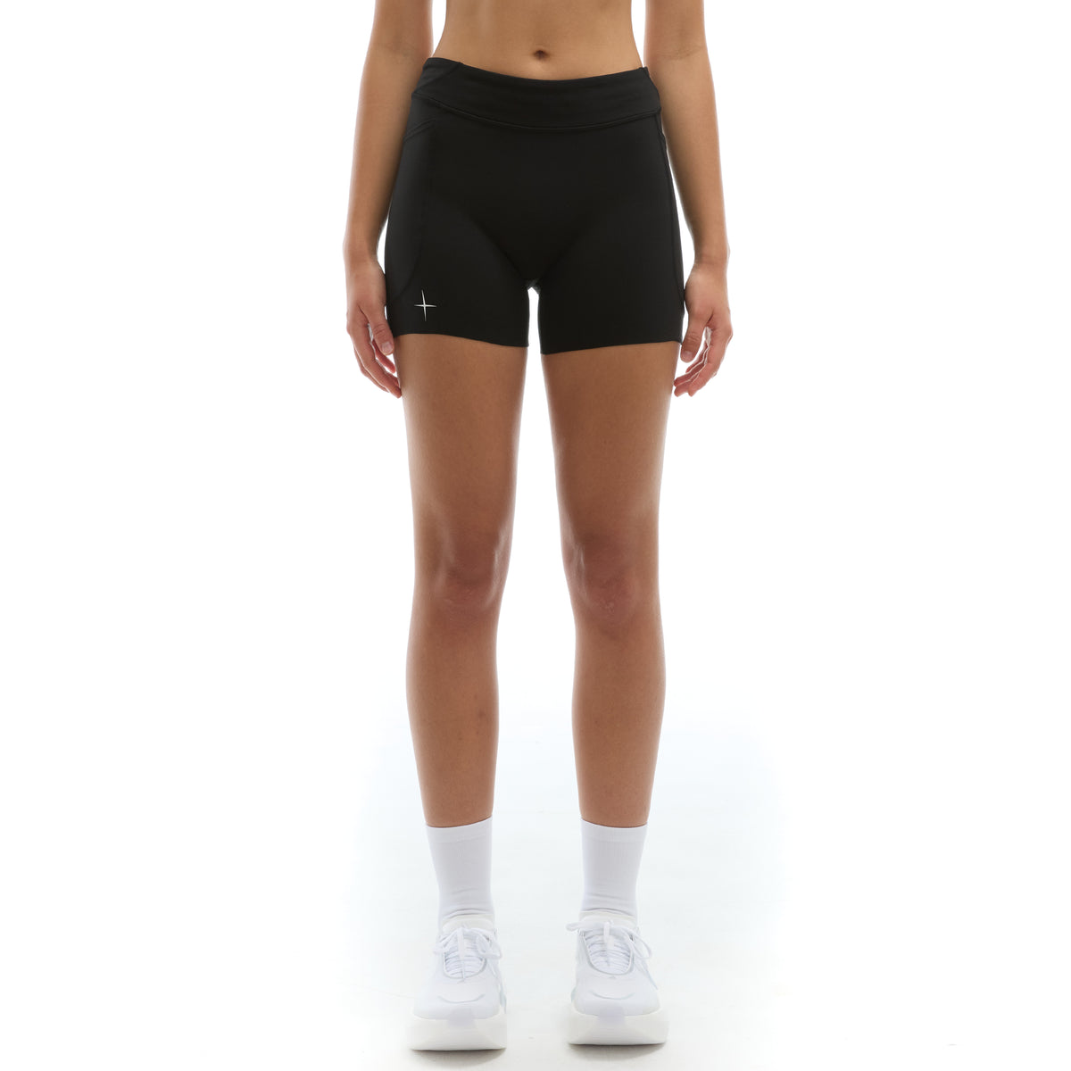 INNER SELF Women's 4" Half Tights W/ Pockets in black — front view on female model