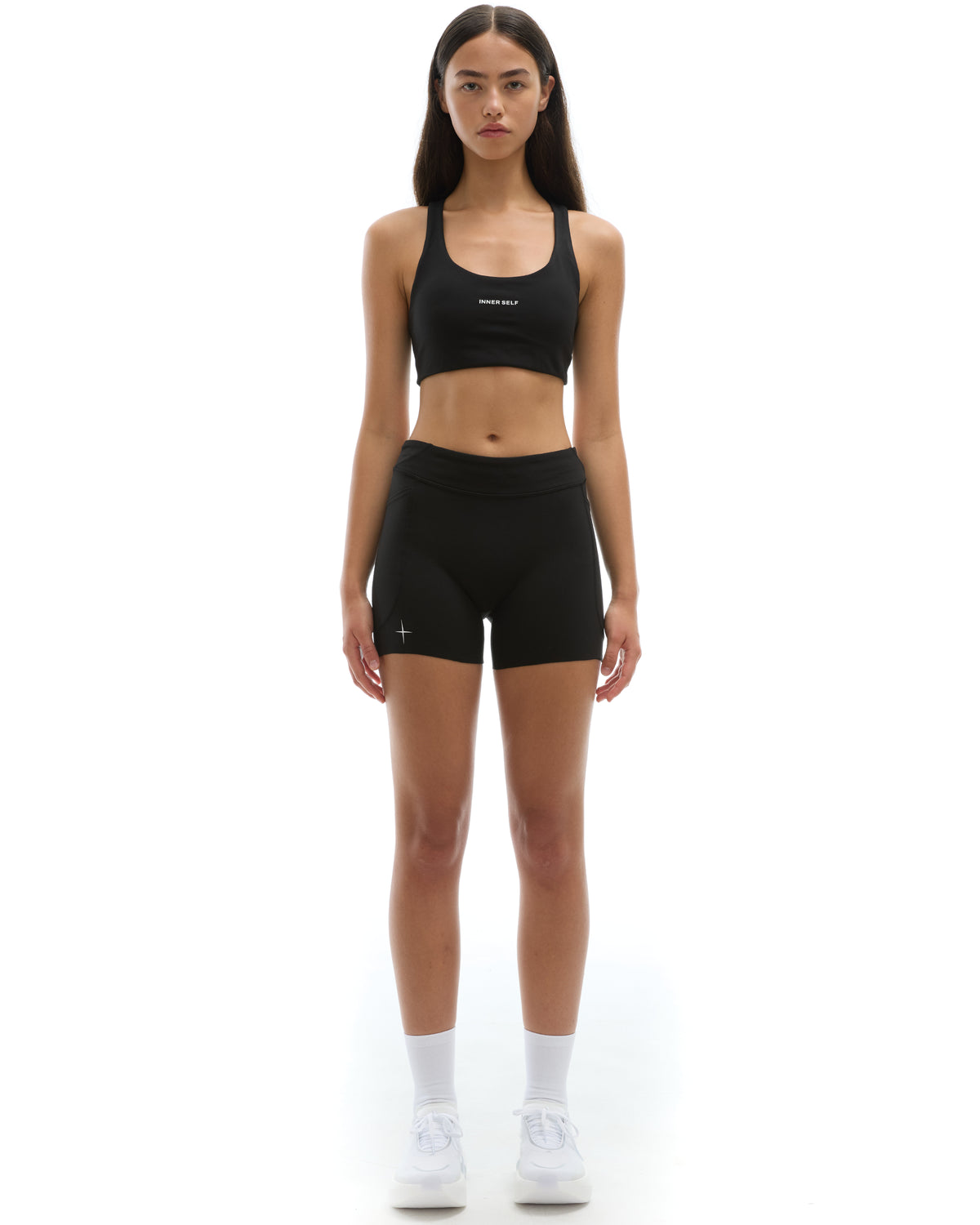 INNER SELF Women's 4" Half Tights W/ Pockets in black — full-length view on female model