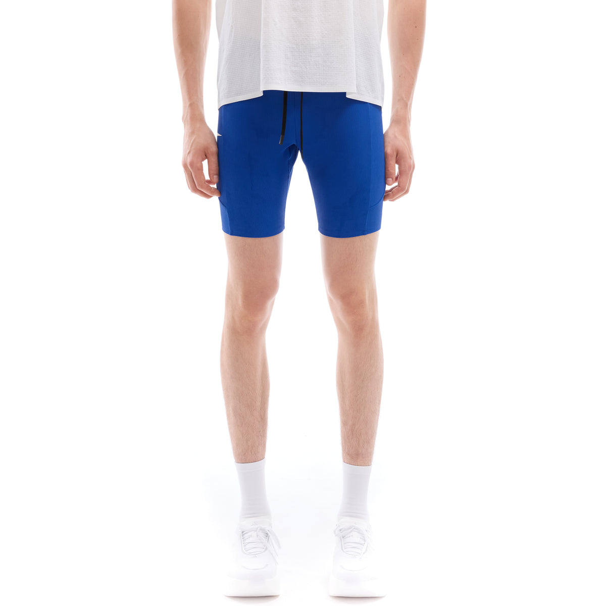 INNER SELF Men's Half Tights W/ Pockets in blue — front view on male model