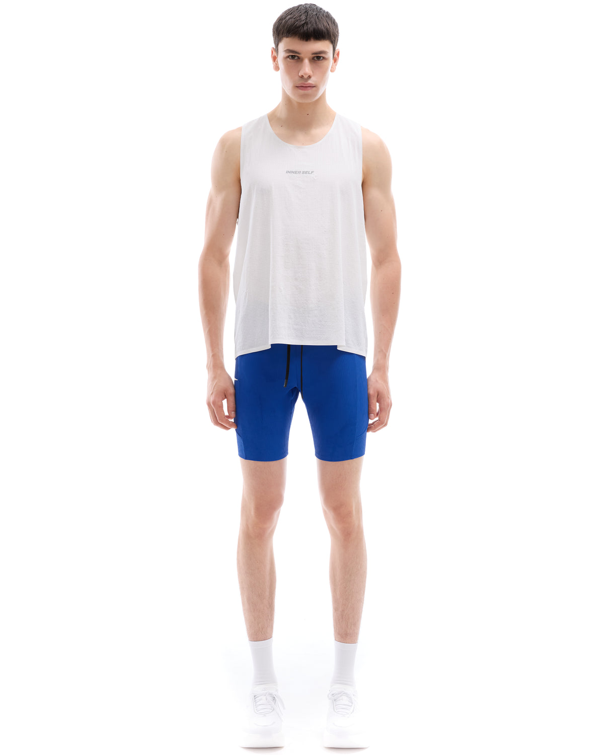 INNER SELF Men's Half Tights W/ Pockets in blue — full-length view on male model