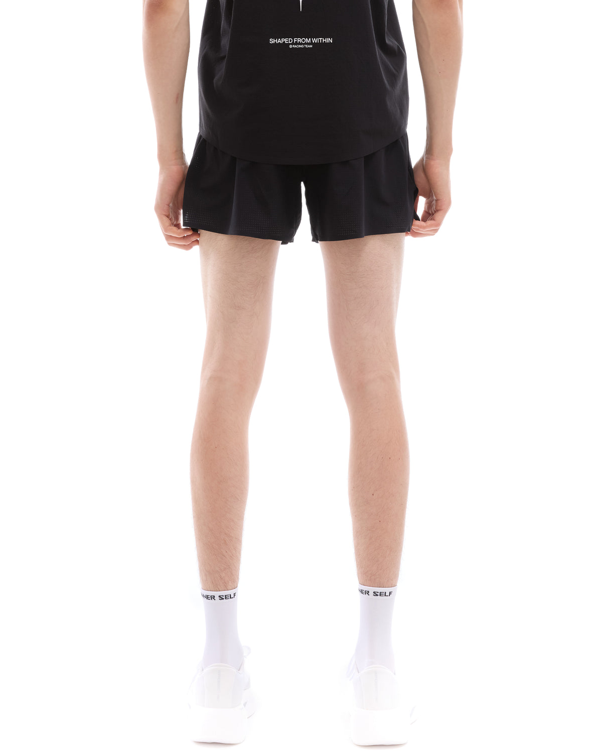 INNER SELF Men's Race Shorts in black — back view on male model