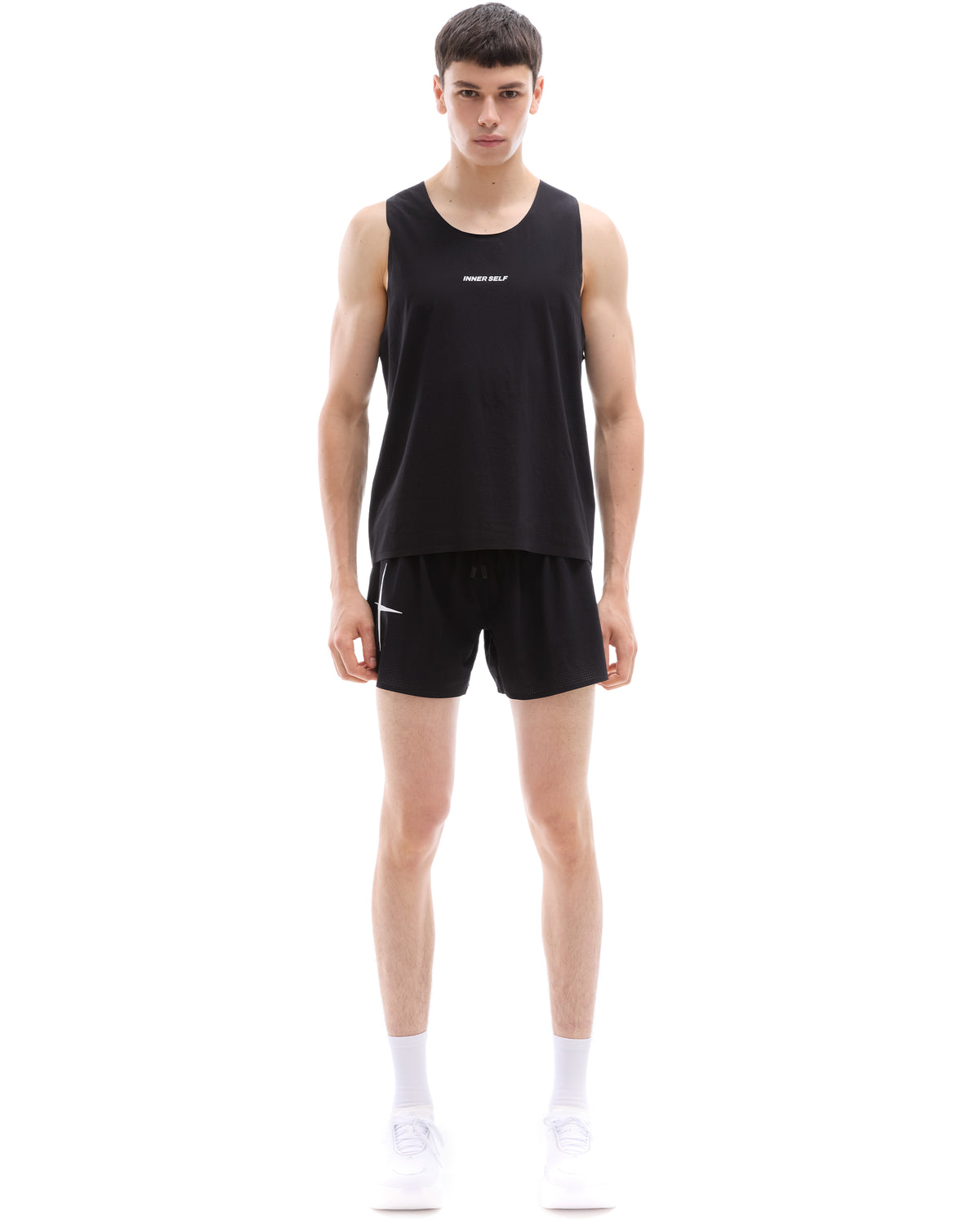 INNER SELF Men's Race Shorts in black — full-length view on male model