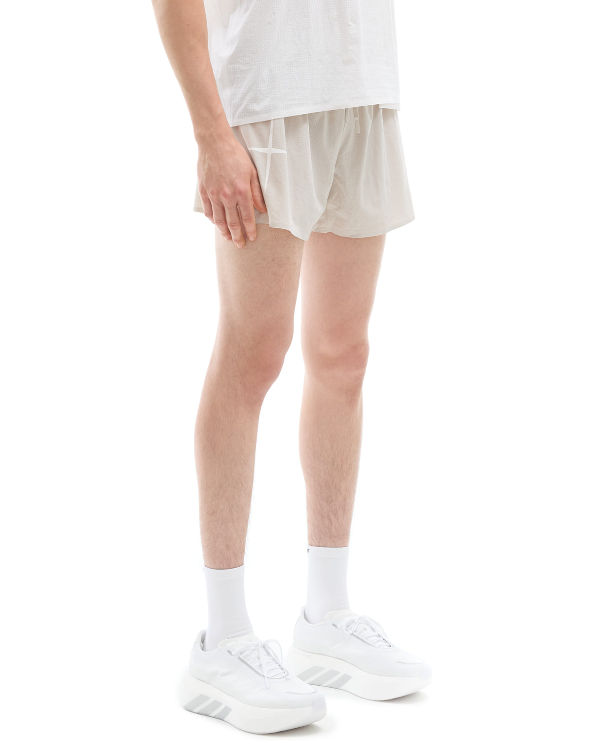 INNER SELF Men's Race Shorts in gray — three-quarter view on male model