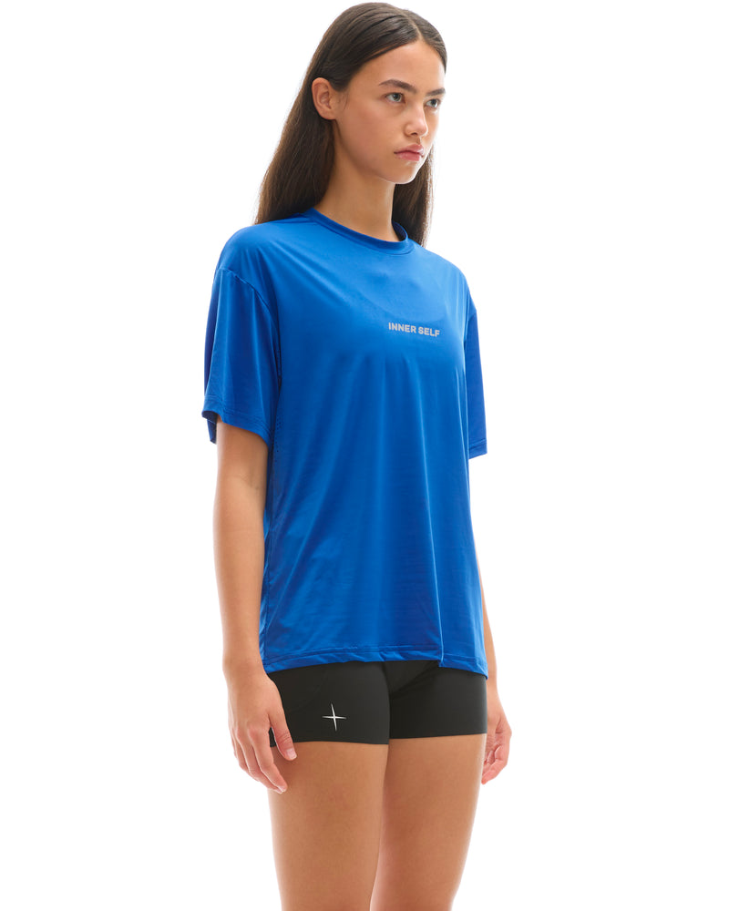 INNER SELF Performance T-shirt in blue — three-quarter view on female model