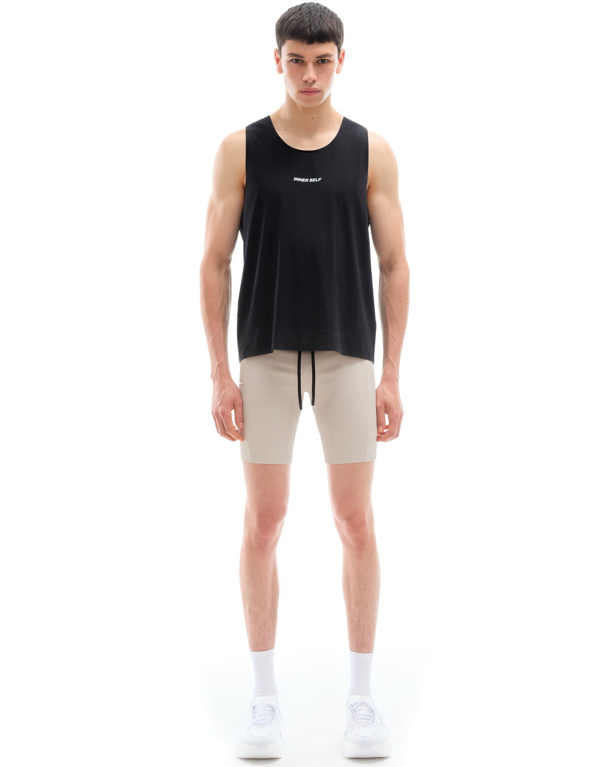 INNER SELF Performance Singlet in black — full-length view on male model