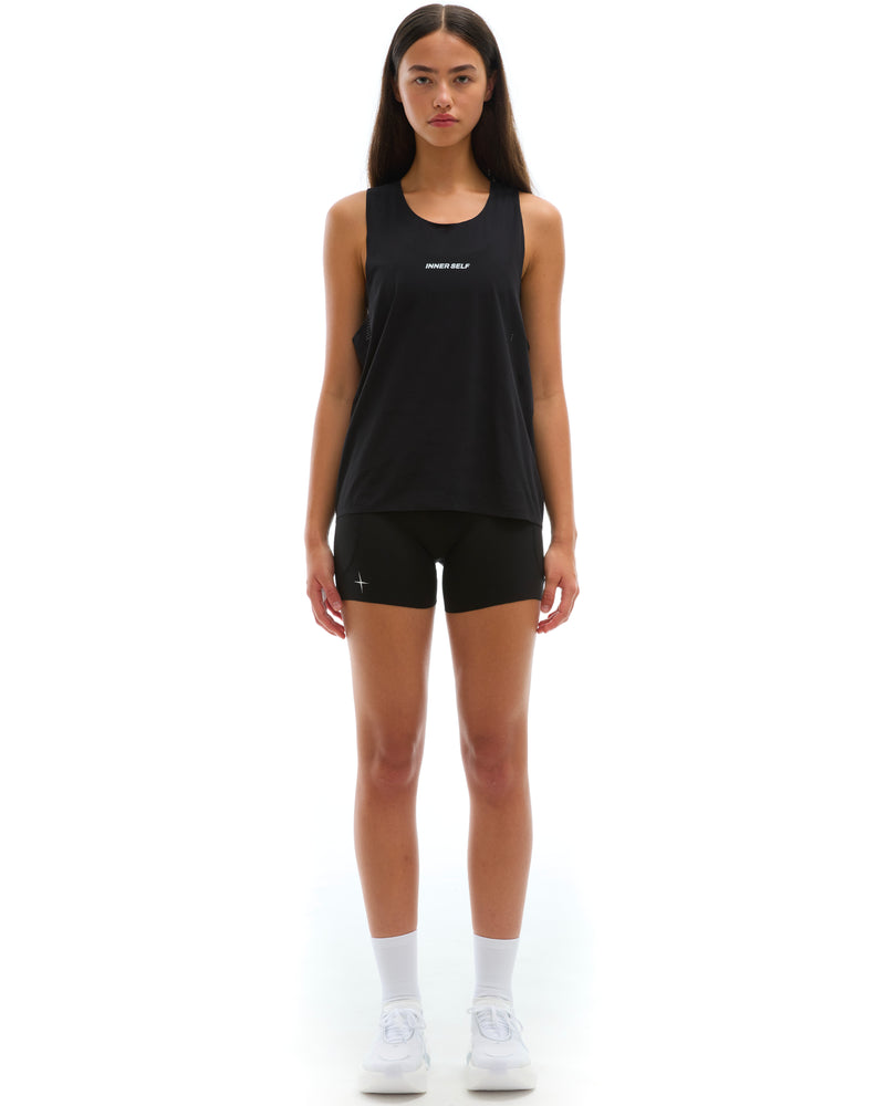 INNER SELF Performance Singlet in black — full-length view on female model