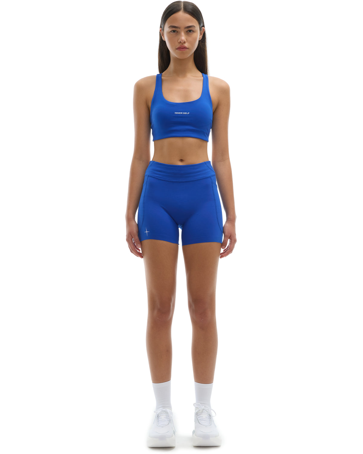 INNER SELF Women's 4" Half Tights W/ Pockets in blue — full-length view on female model