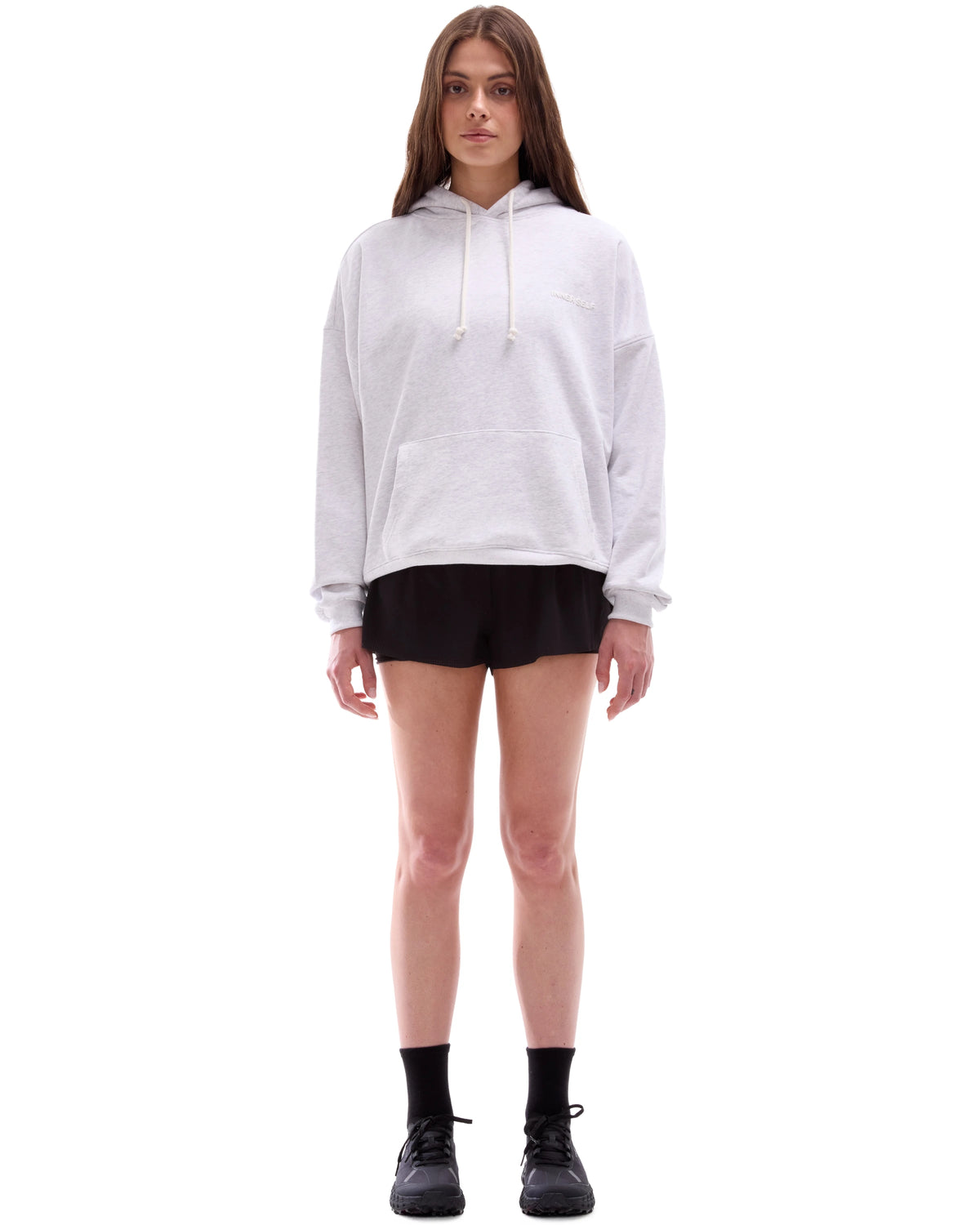 INNER SELF Core Hoodie in grey — full-length view on female model