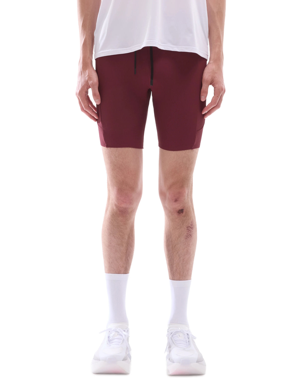 INNER SELF Men's Half Tights W/ Pockets in red — front view on male model