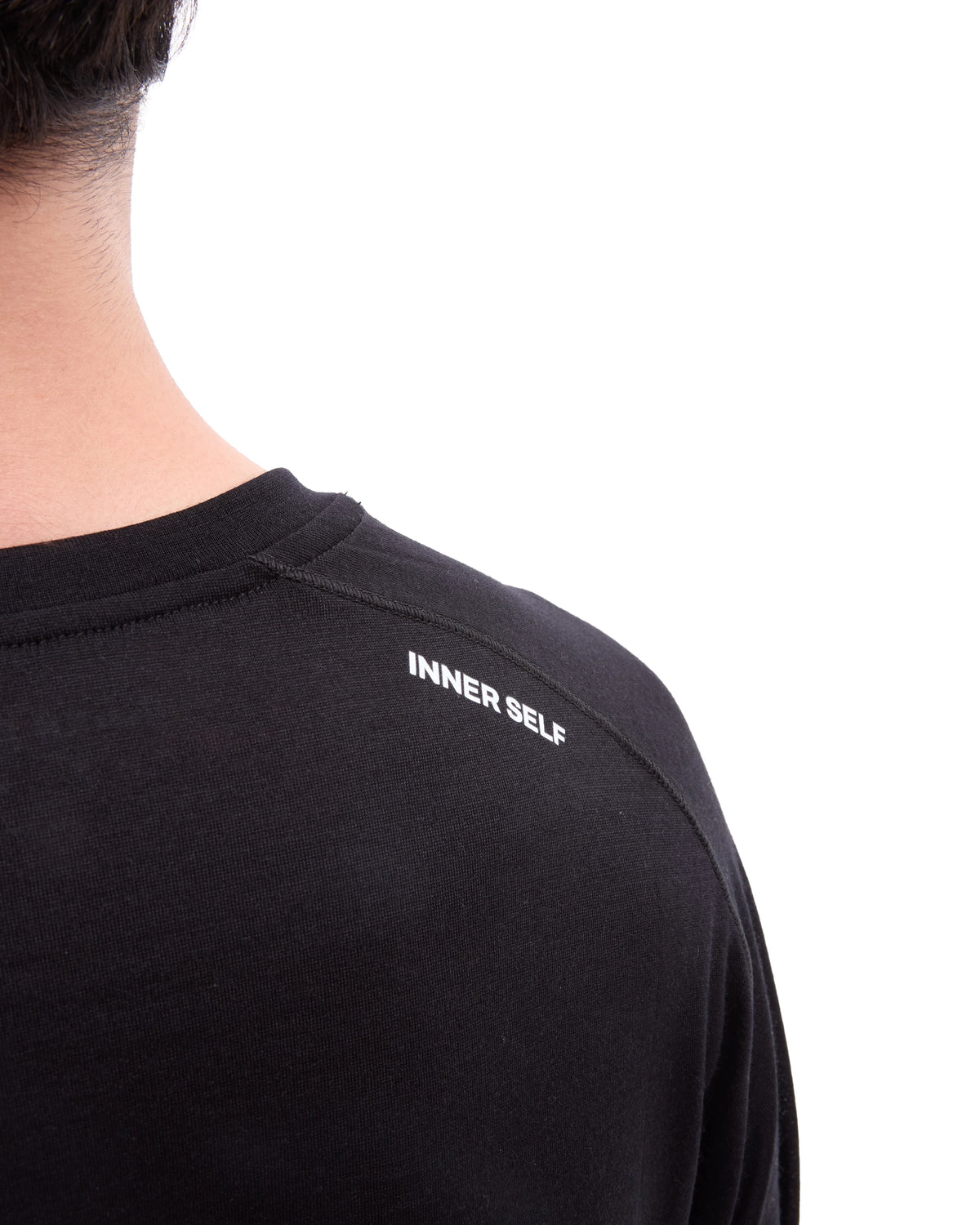 INNER SELF Lightweight Merino Running LS in black — close-up detail