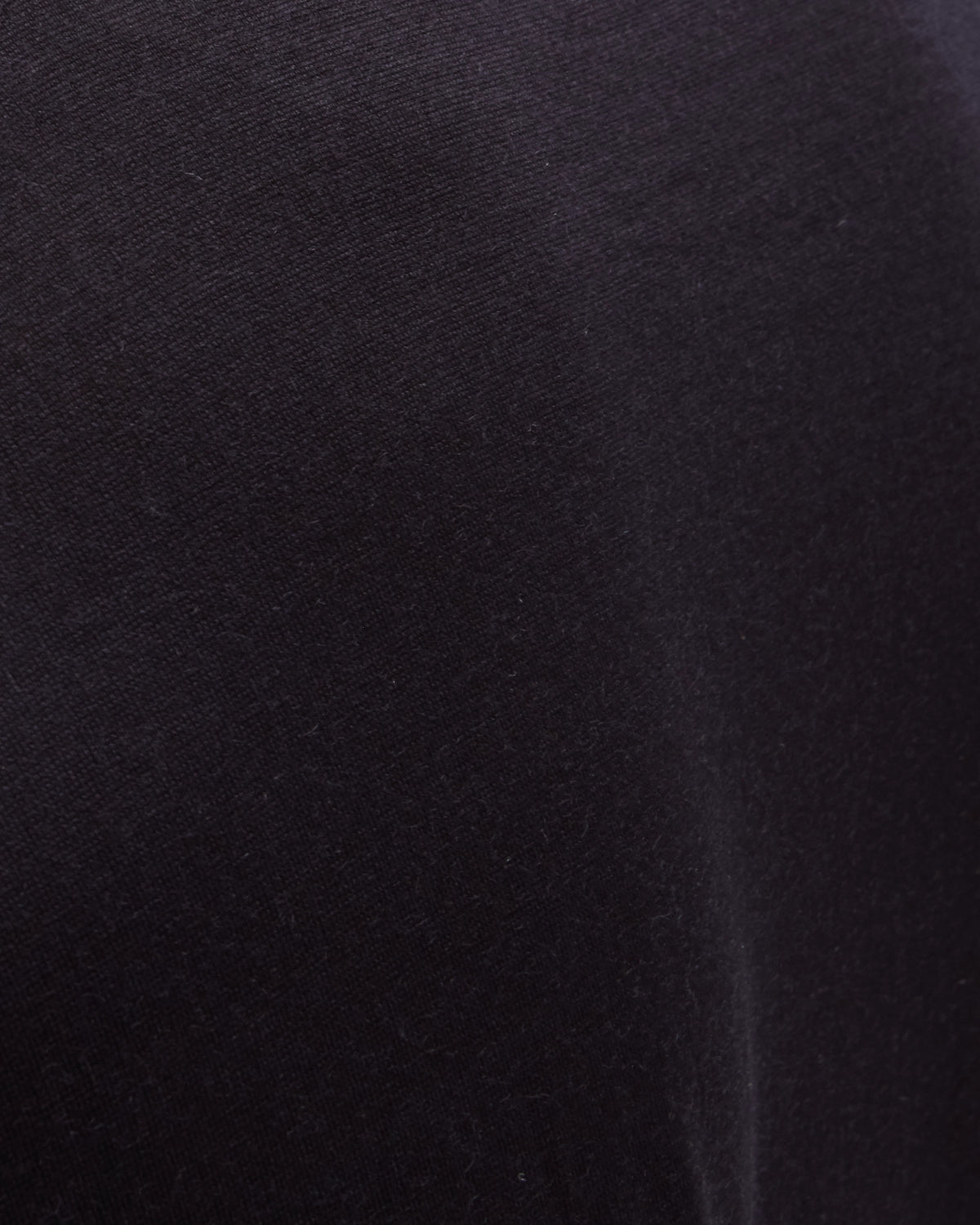 INNER SELF Lightweight Merino Running LS in black — flat lay product shot