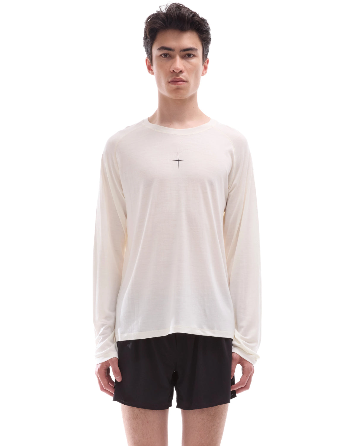 INNER SELF Lightweight Merino Running LS in off-white — front view on male model