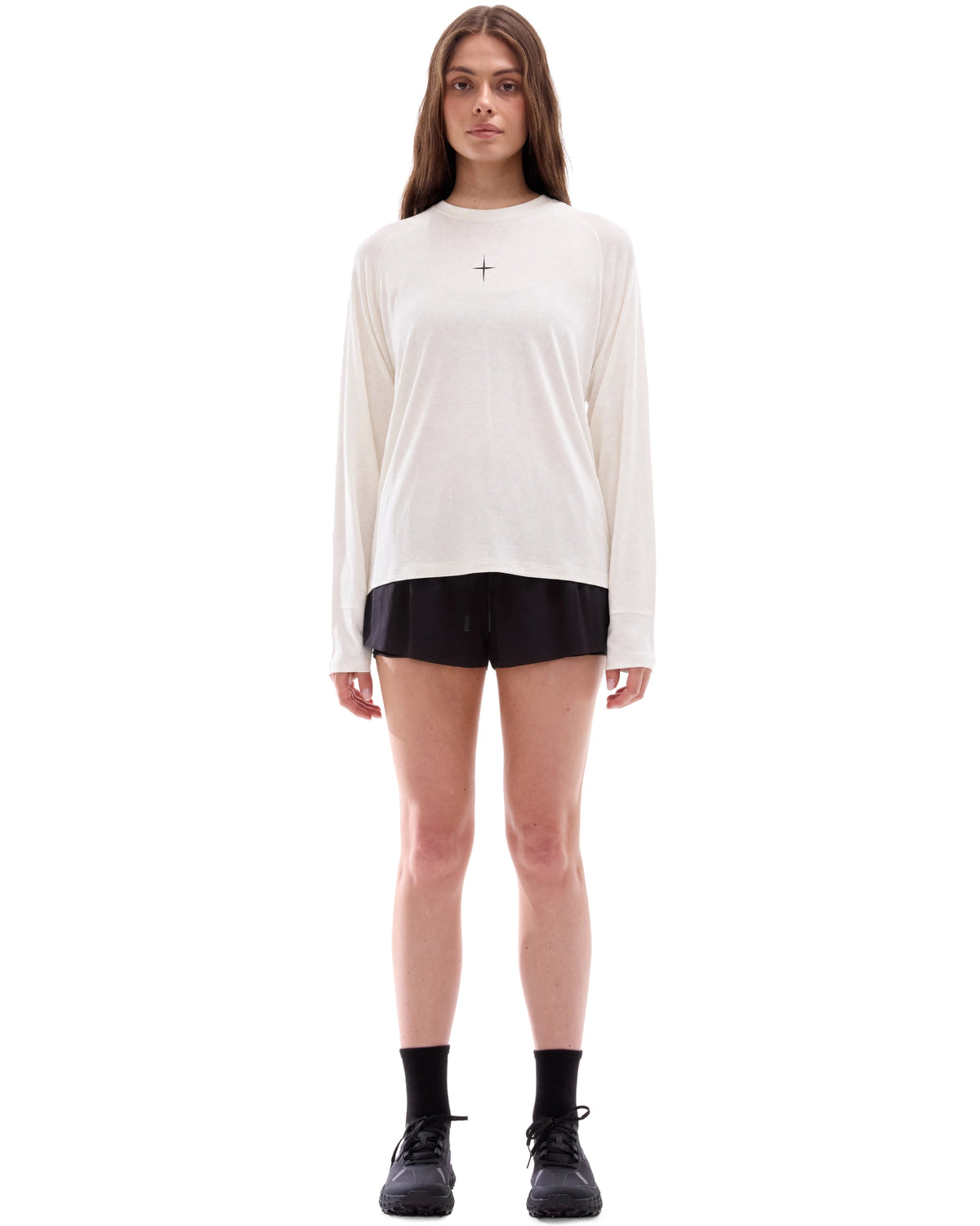 INNER SELF Lightweight Merino Running LS in off-white — full-length view on female model
