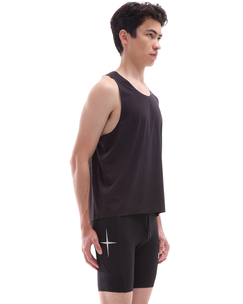 INNER SELF Performance Singlet in black — three-quarter view on male model
