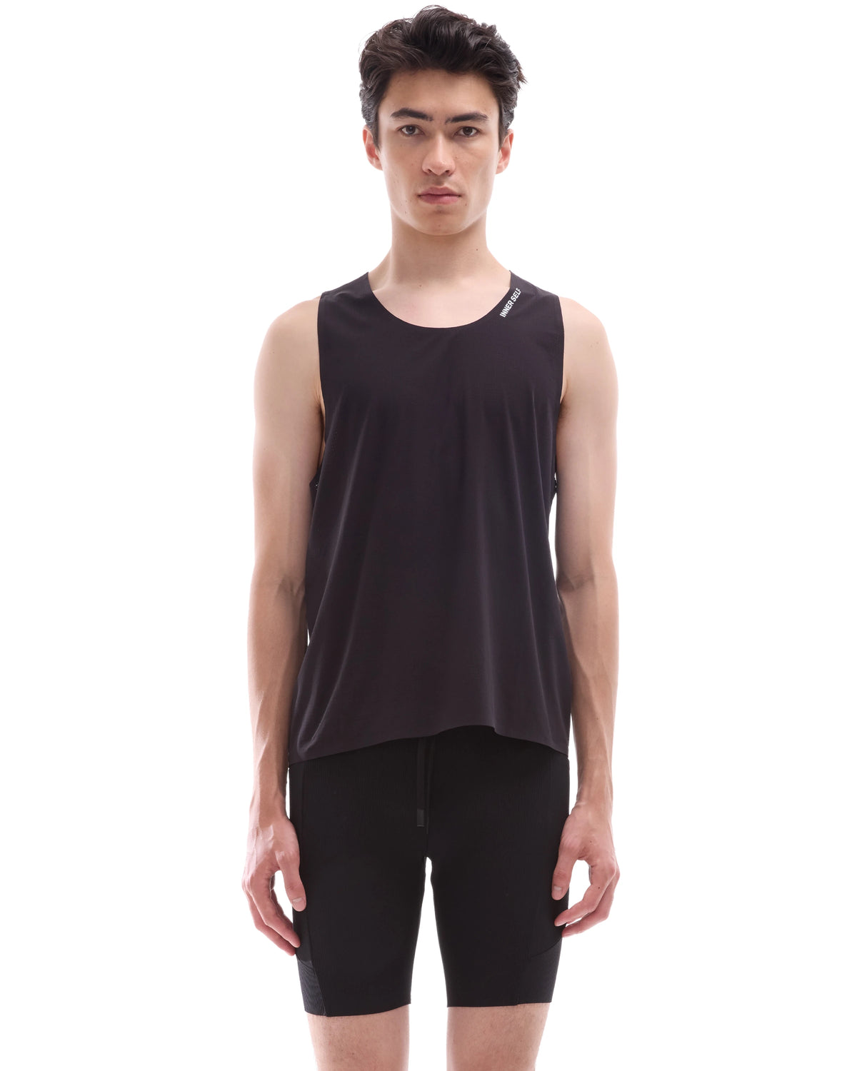 INNER SELF Performance Singlet in black — front view on male model