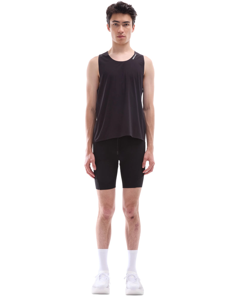 INNER SELF Performance Singlet in black — full-length view on male model