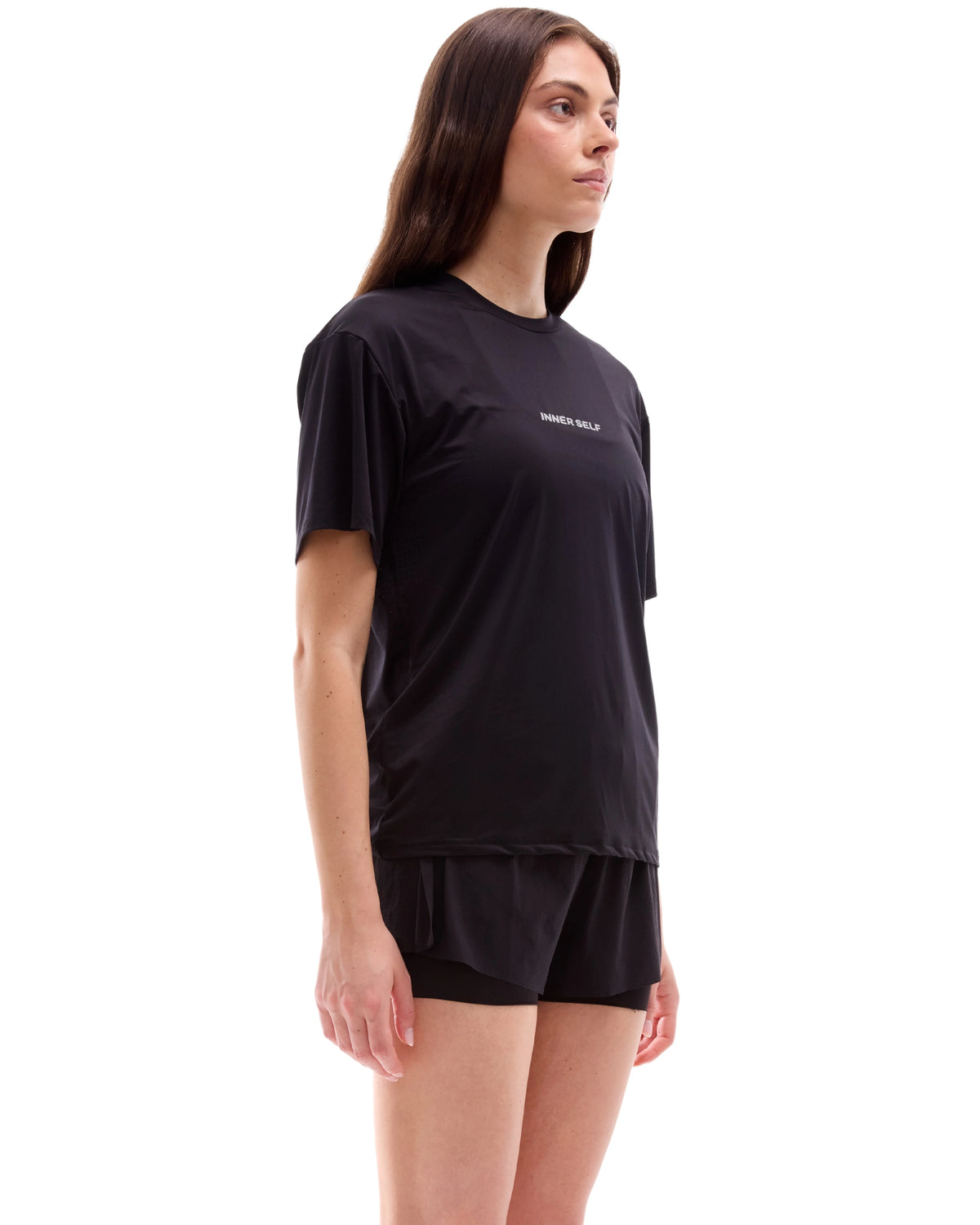 INNER SELF Performance T-shirt in black — three-quarter view on female model