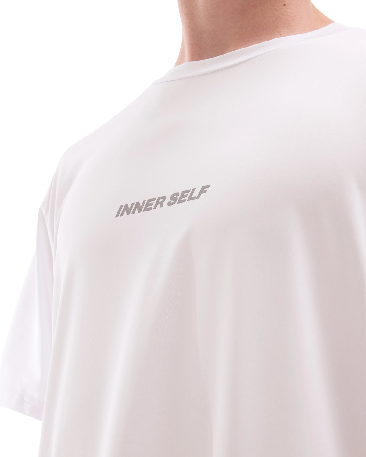 INNER SELF Performance T-shirt in off-white — close-up detail