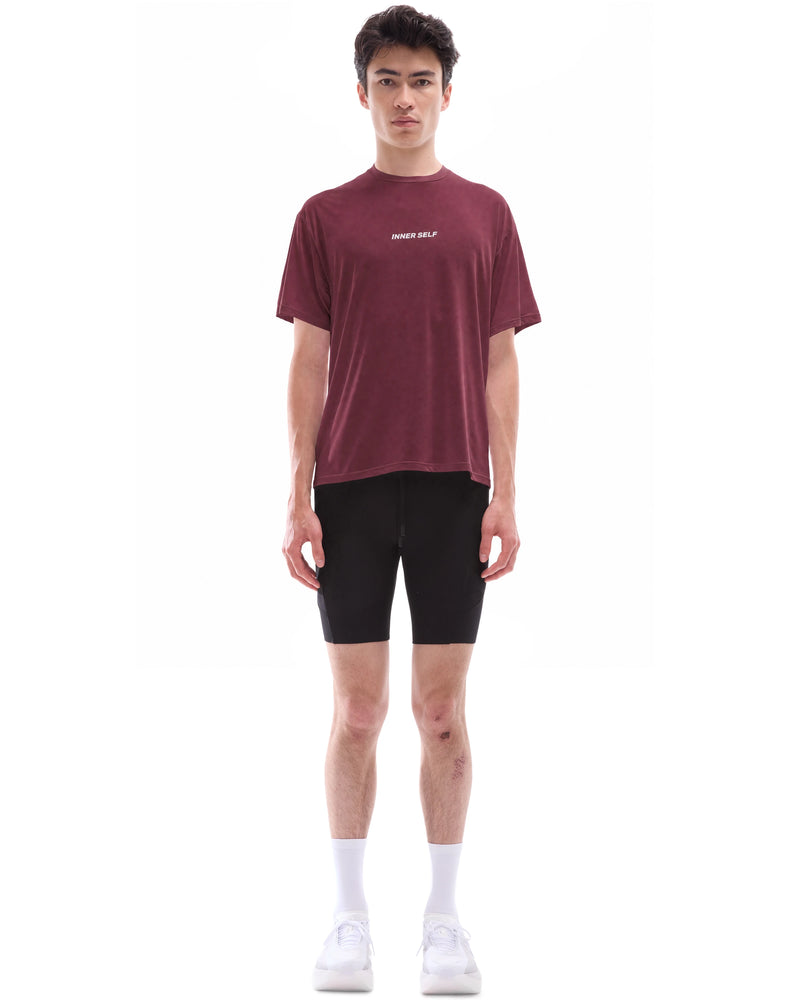 INNER SELF Performance T-shirt in red — full-length view on male model