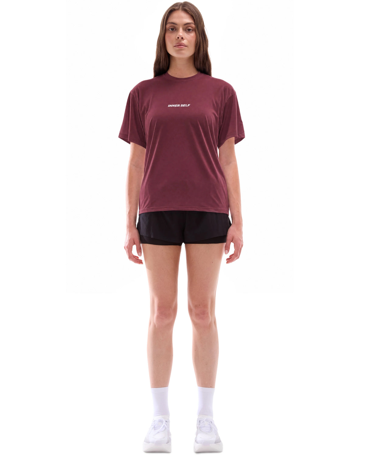INNER SELF Performance T-shirt in red — full-length view on female model