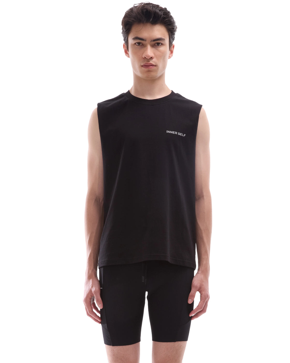 INNER SELF Running Tank in washed black — front view on male model