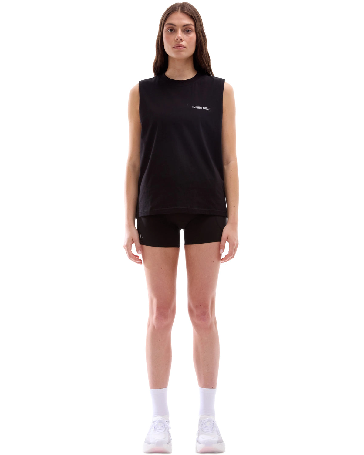 INNER SELF Running Tank in washed black — full-length view on female model