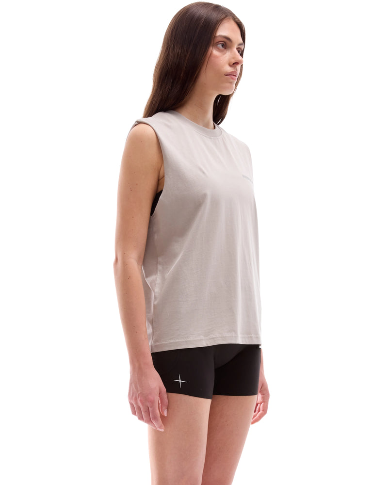 INNER SELF Running Tank in washed grey — three-quarter view on female model