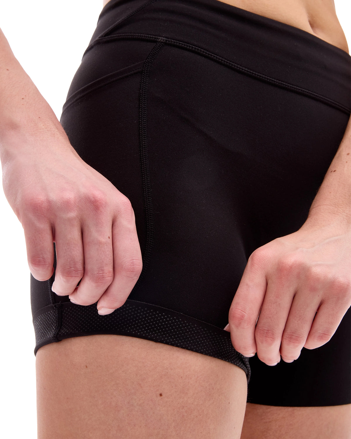 INNER SELF Women's 4'' Half Tights W/ Pockets in black — close-up detail