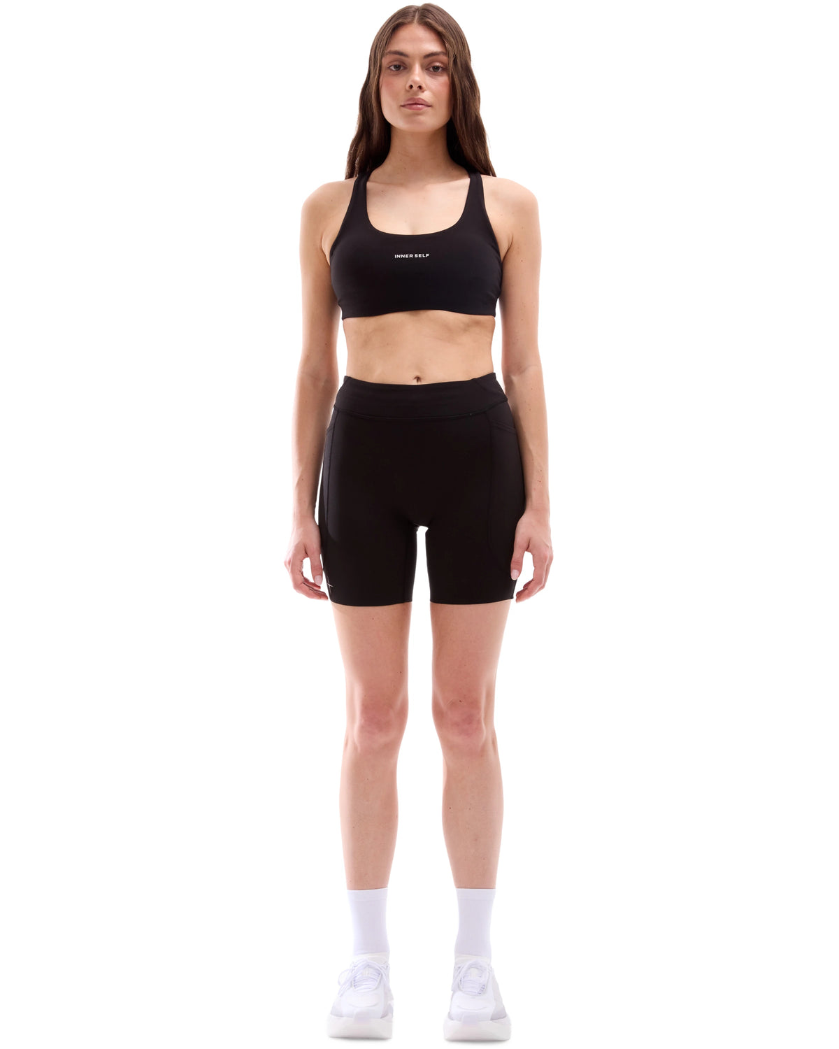 INNER SELF Women's 6.5'' Half Tights W/ Pockets in black — full-length view on female model
