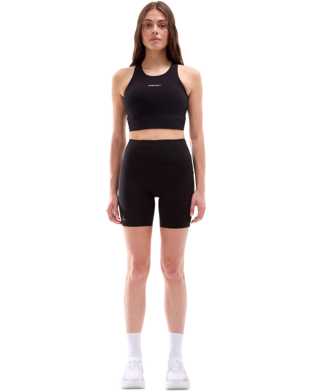 INNER SELF Women's High-Neck Running Crop in black — full-length view on female model